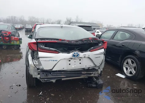2021 Toyota Prius Prime Limited z USA, uszkodzony, nr VIN JTDKAMFP4M3193579
